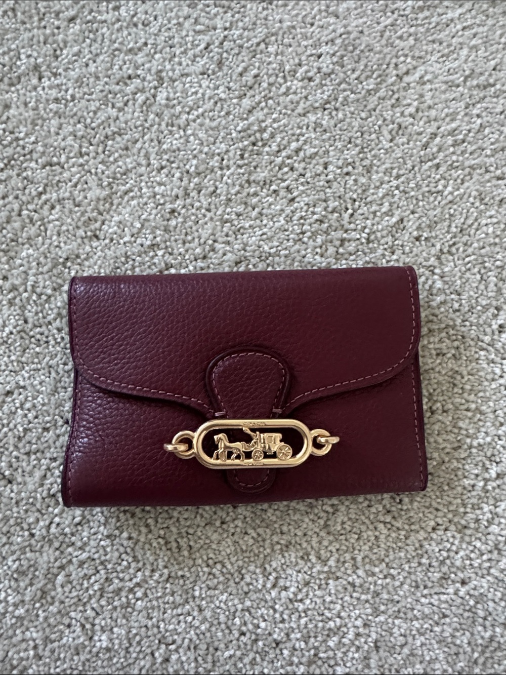 Coach Burgundy Pebbled Leather Wallet with Gold Horse-and-Carriage Hardware